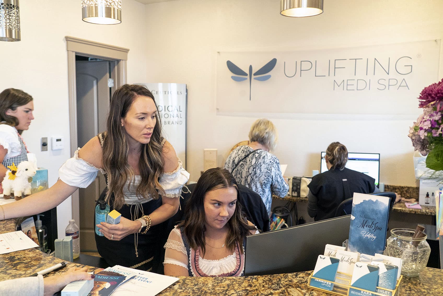 Uplifting Medi Spa staff at the front desk in New Braunfels, TX